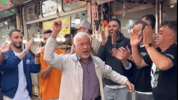 Shopkeeper Sadegh Bagheri arrested after his dancing video. (YouTube) Shopkeeper Sadegh Bagheri arrested after his dancing video