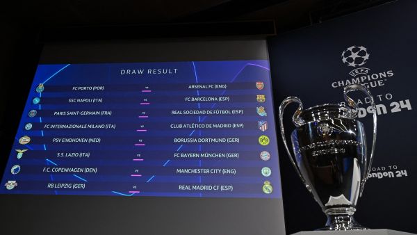 The results are displayed on a screen at the end of the 2023-2024 UEFA Champions League football tournament round of 16 draw at the House of European Football in Nyon, on December 18, 2023. (Photo by Fabrice COFFRINI / AFP)
