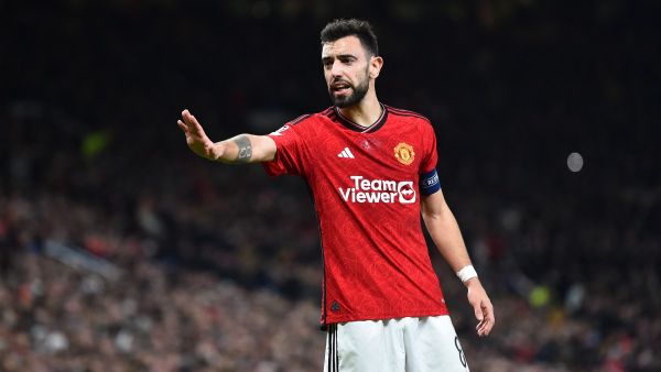 Manchester United's Portuguese midfielder #08 Bruno Fernandes gestures during the UEFA Champions League group A football match between Manchester United and FC Bayern Munich at Old Trafford stadium in Manchester, north west England, on December 12, 2023. (Photo by PETER POWELL / AFP)