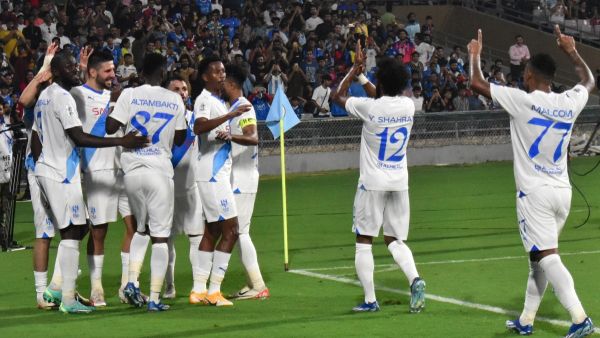Al-Hilal SFC's players celebrate after scoring a goal during the AFC Champions League 2023/24 Group D football match between India's Mumbai City FC and Saudi Arabia’s Al-Hilal SFC at the D.Y. Patil stadium in Navi Mumbai on November 6, 2023. (Photo by AFP)