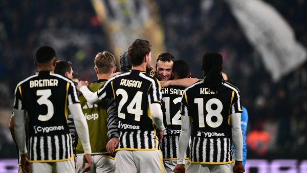 Juventus' Italian defender #04 Federico Gatti celebrates with teammates after winning the Italian Serie A football match between Juventus and Napoli, at The Allianz Stadium, in Turin on December 8, 2023. (Photo by Marco BERTORELLO / AFP)