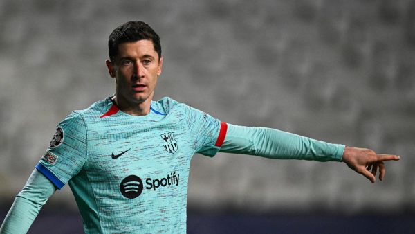 Barcelona's Polish forward #09 Robert Lewandowski gestures during the UEFA Champions League Group H football match between Royal Antwerp FC and FC Barcelona at the Bosuilstadion in Antwerp, on December 13, 2023. (Photo by JOHN THYS / AFP)