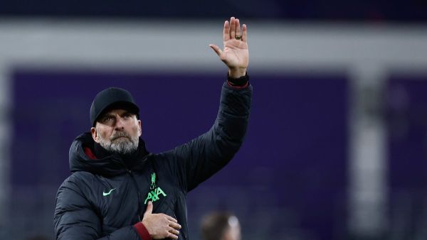 Liverpool's German manager Jurgen Klopp greets the public at the end of the UEFA Europa League football match between Union Saint Gilloise and Liverpool FC at the Lotto Park in Brussels on December 14, 2023. (Photo by Kenzo TRIBOUILLARD / AFP)