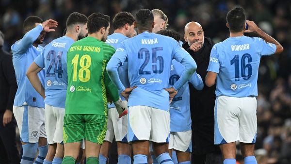 Manchester City's Spanish manager Pep Guardiola gives instructions to his players during the UEFA Champions League Group G football match between Manchester City and RG Leipzig at the Etihad Stadium, in Manchester, north west England, on November 28, 2023. (Photo by Oli SCARFF / AFP)