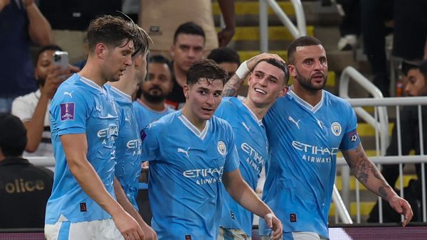 Manchester City's English midfielder #47 Phil Foden (2R) celebrates after with teammates scoring their third goal during the FIFA Club World Cup 2023 football final match between England's Manchester City and Brazil's Fluminense at King Abdullah Sports City Stadium in Jeddah on December 22, 2023. (Photo by Giuseppe CACACE / AFP)