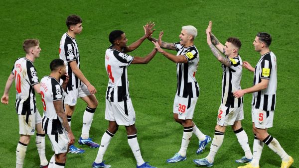 Newcastle United's Swedish striker #14 Alexander Isak (C-L) celebrates with Newcastle United's Brazilian midfielder #39 Bruno Guimaraes (C-R) and teammates after opening the scoring during the UEFA Champions League 1st round, day 5, Group F football match between Paris Saint-Germain (PSG) and Newcastle United at the Parc des Princes stadium in Paris, on November 28, 2023. (Photo by Alain JOCARD / AFP)