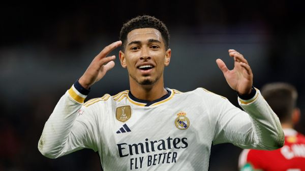 Real Madrid's English midfielder #5 Jude Bellingham reacts during the Spanish league football match between Real Madrid CF and Granada FC at the Santiago Bernabeu stadium in Madrid on December 1, 2023. (Photo by OSCAR DEL POZO / AFP)