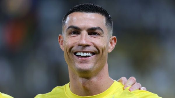 Nassr's Portuguese forward #07 Cristiano Ronaldo smiles during the AFC Champions League Group E football match between Saudi's al-Nassr and Iran’s Persepolis at the Al-Awwal Stadium in Riyadh on November 27, 2023. (Photo by Fayez NURELDINE / AFP)