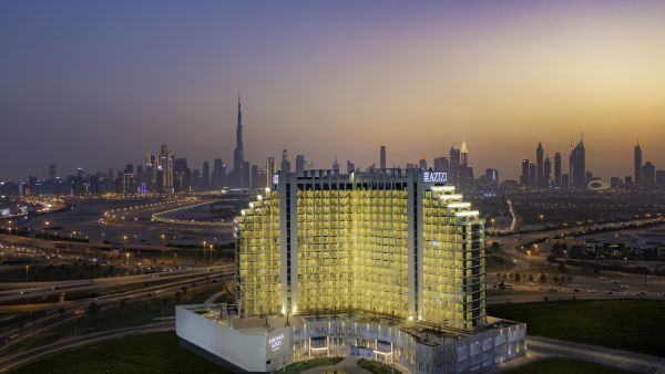Creek Views I-Night shot. Azizi Developments assigns Italian-based Talenti for the supply of premium sun loungers for Creek Views I