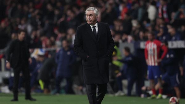 Real Madrid's Italian coach Carlo Ancelotti walks along the touchline during the Spanish Copa del Rey (King's Cup) football match between Club Atletico de Madrid and Real Madrid CF at the Metropolitano stadium in Madrid on January 18, 2024. (Photo by Thomas COEX / AFP)