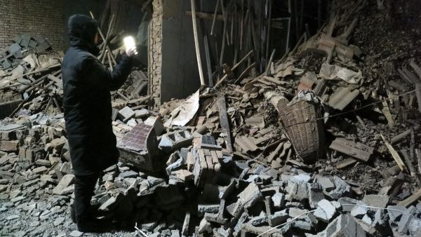 7.1-magnitude earthquake strikes China's Xinjiang region, tremors reach neighboring countries. (Chinatopix/ AP)