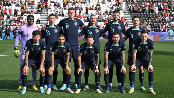 Australia's players pose for the group picture before the start of the Qatar 2023 AFC Asian Cup Group B football match between Syria and Australia at the Jassim bin Hamad Stadium in Doha on January 18, 2024. (Photo by HECTOR RETAMAL / AFP)
