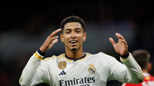 Real Madrid's English midfielder #5 Jude Bellingham reacts during the Spanish league football match between Real Madrid CF and Granada FC at the Santiago Bernabeu stadium in Madrid on December 1, 2023. (Photo by OSCAR DEL POZO / AFP)