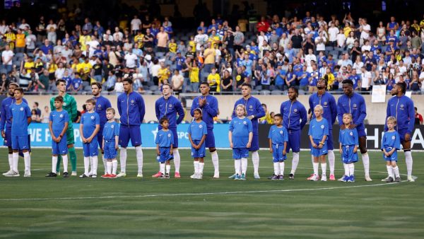Chelsea players stand for their national anthem ahead of a pre-season friendly football match between Chelsea FC and Borussia Dortmund BVB at Soldier Field in Chicago, Illinois, on August 2, 2023. (Photo by KAMIL KRZACZYNSKI / AFP)