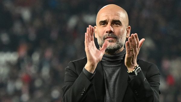Manchester City's Spanish manager Pep Guardiola celebrates after winning the UEFA Champions League Group G day 6 group stage football match between Crvena Zvezda (Red Star Belgrade) and Manchester City at the Red Star stadium in Belgrade, on December 13, 2023. (Photo by ANDREJ ISAKOVIC / AFP)