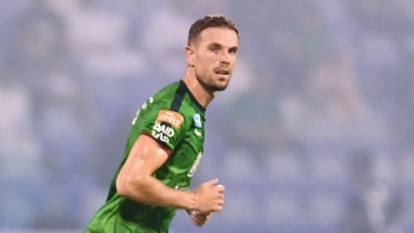 Ettifaq's English midfielder #10 Jordan Henderson runs past Nassr's Senegalese Forward #10 Sadio Mane during the Saudi Pro League football match between Al-Ettifaq and Al-Nassr at the Prince Mohamed bin Fahd Stadium in Dammam on August 14, 2023. (Photo by Ali Alhaji / AFP)