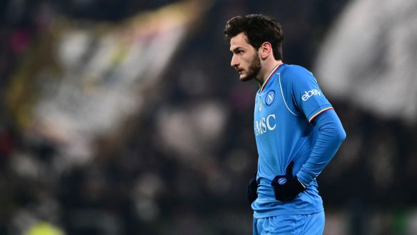 Napoli's Georgian forward #77 Khvicha Kvaratskhelia looks on during the Italian Serie A football match between Juventus and Napoli, at The Allianz Stadium, in Turin on December 8, 2023. (Photo by Marco BERTORELLO / AFP)