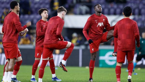 Liverpool FC's players participate in the warming session prior to the start of the UEFA Europa League football match between Union Saint Gilloise and Liverpool FC at the Lotto Park in Brussels on December 14, 2023. (Photo by KENZO TRIBOUILLARD / AFP)
