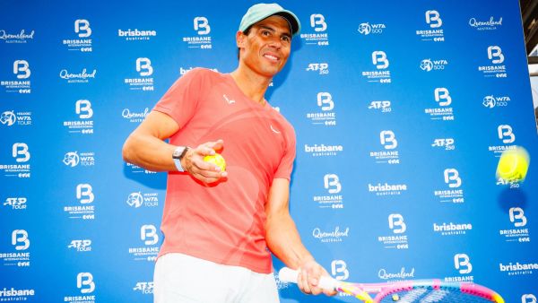 Spain's Rafael Nadal hits balls to fans during a promotional event ahead of the Brisbane International tennis tournament in Brisbane on December 29, 2023. (Photo by Patrick HAMILTON / AFP)