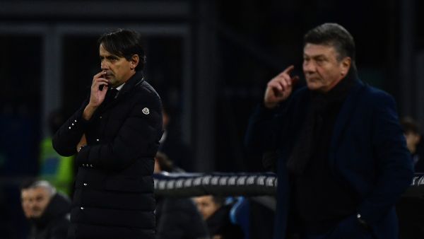 Inter Milan's Italian coach Simone Inzaghi (L) and Napoli's Italian head coach Walter Mazzari gesture during the Italian Serie A football match between Napoli and Inter Milan on December 03, 2023 at the Diego Armando Maradona stadium in Naples. (Photo by Filippo MONTEFORTE / AFP)