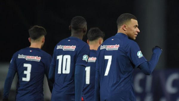 Paris Saint-Germain's French forward #07 Kylian Mbappe (R) reacts after scoring his team's second goal during the French Cup round of 32 football match between US Orleans Loiret Football and Paris Saint-Germain (PSG) at the Stade de la Source, in Orleans, central France, on January 20, 2024. (Photo by Guillaume SOUVANT / AFP)