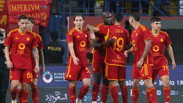 Roma's players celebrate their second goal, during a friendly football match with Saidi's Al-Shabab at Al-Awwal Park in Riyadh, on January 24, 2024. (Photo by Fayez NURELDINE / AFP)