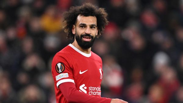 Liverpool's Egyptian striker #11 Mohamed Salah smiles during the UEFA Europa League group E football match between Liverpool and Linzer ASK at Anfield in Liverpool, north west England on November 30, 2023. (Photo by Oli SCARFF / AFP)