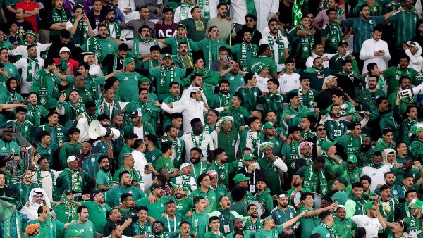 Saudi Arabia supporters cheer during the Qatar 2023 AFC Asian Cup Group F football match between Saudi Arabia and Thailand at Education City Stadium in al-Rayyan, west of Doha, on January 25, 2024. (Photo by Giuseppe CACACE / AFP)