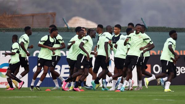 Senegal's national team players take part in a training session in Yamoussoukro on January 28, 2024, on the eve of the 2024 Africa Cup of Nations (CAN) round of 16 football match between Senegal and Ivory Coast. (Photo by Kenzo TRIBOUILLARD / AFP)