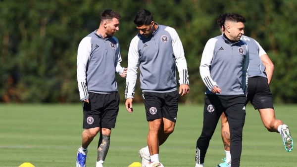 Lionel Messi #10 and Luis Suarez #9 of Inter Miami CF speak on the field during an Inter Miami CF Training Session at Florida Blue Training Center on February 20, 2024 in Fort Lauderdale, Florida. Megan Briggs/Getty Images/AFP (Photo by Megan Briggs / GETTY IMAGES NORTH AMERICA / Getty Images via AFP)