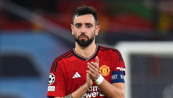 Manchester United's Portuguese midfielder #08 Bruno Fernandes reacts after the UEFA Champions League group A football match between Manchester United and FC Bayern Munich at Old Trafford stadium in Manchester, north west England, on December 12, 2023. (Photo by PETER POWELL / AFP)