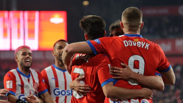 Girona's Ukrainian forward #09 Artem Dovbyk celebrates scoring his team's third goal during the Spanish League football match between Girona FC and Sevilla FC at the Montilivi stadium in Girona on January 21, 2024. (Photo by LLUIS GENE / AFP)