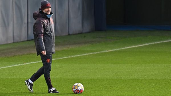 Manchester City's Spanish manager Pep Guardiola attends a training session at Manchester City's training ground in north-west England on February 12, 2024, on the eve of their UEFA Champions League Group round of 16 football match against FC Copenhagen. (Photo by Paul ELLIS / AFP)