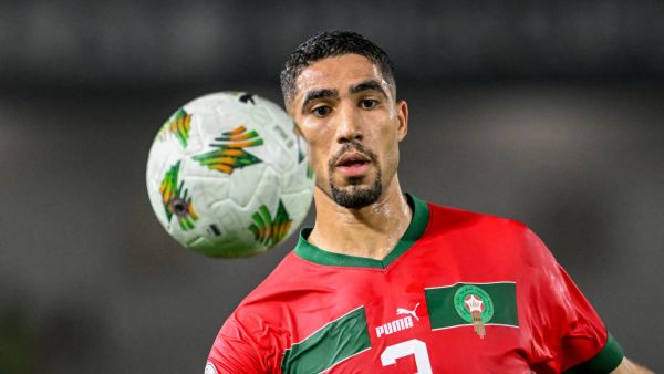 Morocco's defender #2 Achraf Hakimi looks at the ball during the Africa Cup of Nations (CAN) 2024 round of 16 football match between Morocco and South Africa at the Stade Laurent Pokou in San Pedro on January 30, 2024. (Photo by SIA KAMBOU / AFP)