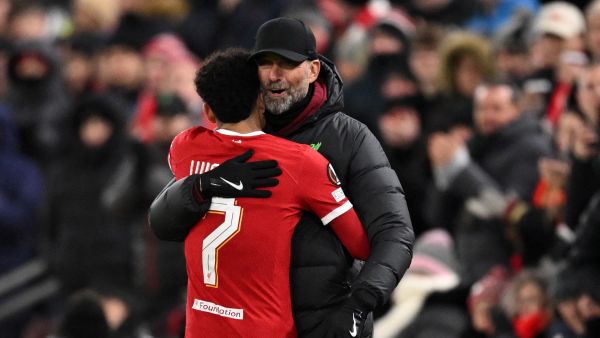 Liverpool's German manager Jurgen Klopp embraces Liverpool's Colombian midfielder #07 Luis Diaz as he leaves the game, substituted during the UEFA Europa League group E football match between Liverpool and Linzer ASK at Anfield in Liverpool, north west England on November 30, 2023. (Photo by Oli SCARFF / AFP)