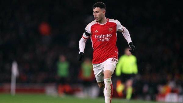 Arsenal's Brazilian midfielder #11 Gabriel Martinelli runs with the ball during the UEFA Champions League Group B football match between Arsenal and RC Lens at the Arsenal Stadium in north London on November 29, 2023. (Photo by Adrian DENNIS / AFP)