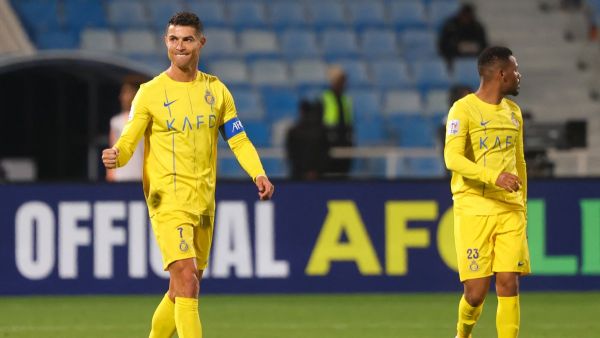 Nassr's Portuguese forward #07 Cristiano Ronaldo celebrates his goal during the AFC Champions League football match between and Saudi Arabia’s Al-Feiha and Saudi Arabia's Al-Nassr at Prince Faisal Bin Fahd Stadium in Riyadh on February 14, 2024. (Photo by Fayez NURELDINE / AFP)