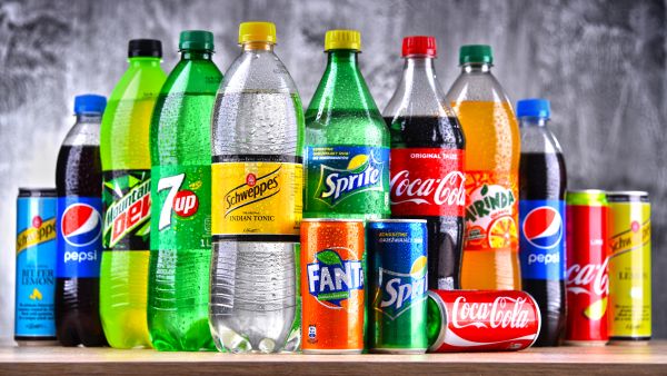 Bottles of global soft drink brands including products of Coca Cola