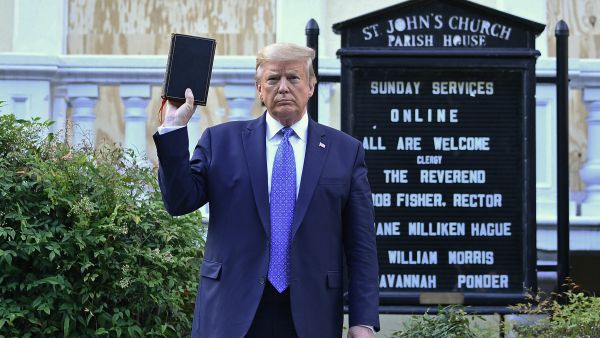 Donald Trump is selling $59.99 bibles with ‘God Bless the U.S.A.’ singer Lee Greenwood. (Brendan Smialowski/ AFP)