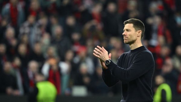 Bayer Leverkusen's Spanish head coach Xabi Alonso celebrates at the end of the UEFA Europa League Group round of 16, second-leg football match between Bayer 04 Leverkusen and Garabagh in Leverkusen, western Germany on March 14, 2024. Bayer Leverkusen won the match 3-2. (Photo by INA FASSBENDER / AFP)