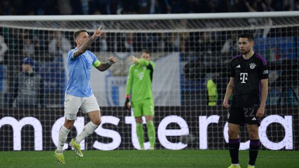 Lazio's Italian forward #17 Ciro Immobile celebrates after scoring a penalty during the UEFA Champions League last 16 first leg between Lazio and Bayern Munich at the Olympic stadium on February 14, 2024 in Rome. (Photo by Filippo MONTEFORTE / AFP)