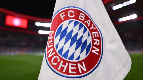 The logo of Bayern Munich is pictured on a corner flag in the Allianz Arena ahead the UEFA Champions League round of 16, second-leg football match between FC Bayern Munich and Lazio in Munich, southern Germany on March 5, 2024. (Photo by Kirill KUDRYAVTSEV / AFP)