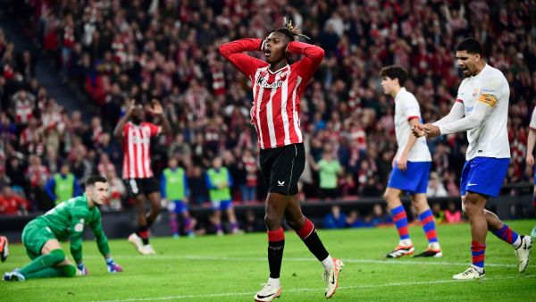 Athletic Bilbao's Spanish forward #11 Nico Williams reacts to missing a goal opportunity during the Spanish Copa del Rey (King's Cup) quarter final football match between Athletic Club Bilbao and FC Barcelona at the San Mames stadium in Bilbao on January 24, 2024. (Photo by ANDER GILLENEA / AFP)