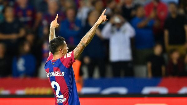 Barcelona's Portuguese defender #02 Joao Cancelo celebrates after scoring his team's third goal during the Spanish Liga football match between FC Barcelona and RC Celta de Vigo at the at the Estadi Olimpic Lluis Companys in Barcelona on September 23, 2023. (Photo by Pau BARRENA / AFP)