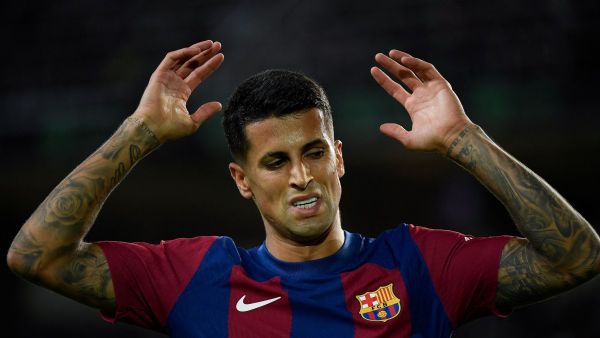 Barcelona's Portuguese defender #02 Joao Cancelo reacts during the Spanish league football match between FC Barcelona and Athletic Club Bilbao at the Estadi Olimpic Lluis Companys in Barcelona on October 22, 2023. (Photo by Josep LAGO / AFP)