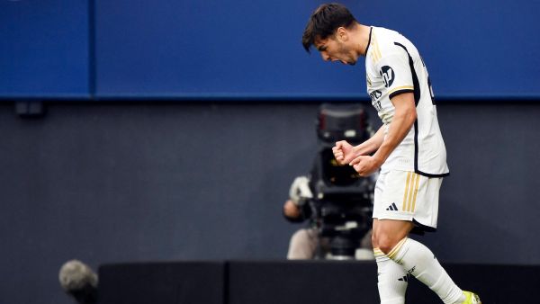 Real Madrid's Spanish forward #21 Brahim Diaz celebrates scoring his team's third goal during the Spanish league football match between CA Osasuna and Real Madrid CF at El Sadar stadium in Pamplona on March 16, 2024. (Photo by ANDER GILLENEA / AFP)