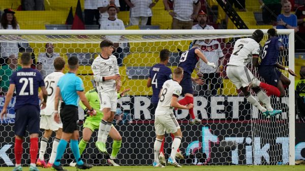 France's midfielder Paul Pogba (R) vies for the header with Germany's defender Antonio Ruediger (2nd-R) during the UEFA EURO 2020 Group F football match between France and Germany at the Allianz Arena in Munich on June 15, 2021. / AFP / POOL / Matthias Schrader