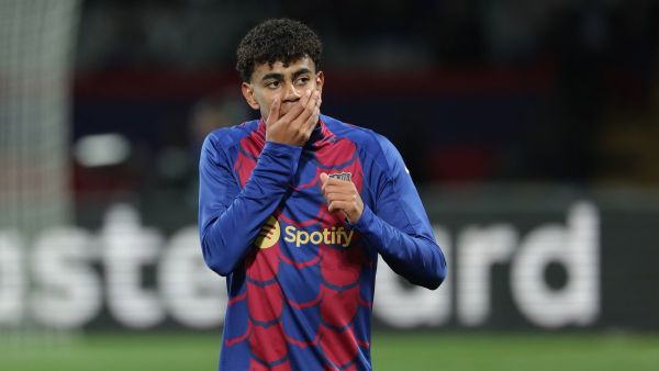 Barcelona's Spanish forward #27 Lamine Yamal warms up prior to the UEFA Champions League last 16 second leg football match between FC Barcelona and SSC Napoli at the Estadi Olimpic Lluis Companys in Barcelona on March 12, 2024. (Photo by LLUIS GENE / AFP)