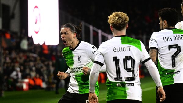 Liverpool's Uruguayan striker #09 Darwin Nunez (L) celebrates scoring his team's third goal with team mates during the UEFA Europa League round of 16 first leg football match between AC Sparta Praha and Liverpool FC in Prague on March 7, 2024. (Photo by Michal Cizek / AFP)