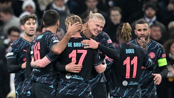 Manchester City's players celebrate during the UEFA Champions League round of 16, first-leg football match between FC Copenhagen and Manchester City in Copenhagen, Denmark, on February 13, 2024. (Photo by Jonathan NACKSTRAND / AFP)